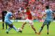 LONDON, ENGLAND - AUGUST 10: Aaron Ramsey of Arsenal is challenged by Fernando (L) and Jesus Navas of Manchester City during the FA Community Shield match between Manchester City and Arsenal at Wembley Stadium on August 10, 2014 in London, England. (Phot