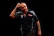 LONDON, ENGLAND - MAY 22: Phil Taylor of England reacts during the McCoys Premier League Darts Play-Offs Semi Final match between Raymond van Barneveld and Phil Taylor at O2 Arena on May 22, 2014 in London, England. (Photo by Ben Hoskins/Getty Images)