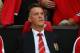 MANCHESTER, ENGLAND - AUGUST 12: Manchester United manager Louis Van Gaal sits on the team bench as he makes his home debut during the Pre Season Friendly match between Manchester United and Valencia at Old Trafford on August 12, 2014 in Manchester, Engl