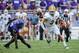 Sep 7, 2013; Fort Worth, TX, USA; Southeastern Louisiana Lions quarterback Bryan Bennett (3) runs past TCU Horned Frogs linebacker Marcus Mallet (54) during the game at Amon G. Carter Stadium. Mandatory Credit: Kevin Jairaj-USA TODAY Sports