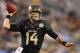 GLENDALE, AZ - JANUARY 01: Quarterback Bryce Petty #14 of the Baylor Bears scrambles to pass during the Tostitos Fiesta Bowl against the UCF Knights at University of Phoenix Stadium on January 1, 2014 in Glendale, Arizona. (Photo by Christian Petersen/G