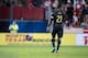Jul 4, 2014; Frisco, TX, USA; Philadelphia Union midfielder Maurice Edu (21) walks off field after receiving a red card during the second half against FC Dallas at Toyota Stadium. FC Dallas defeats Philadelphia Union 2-1. Mandatory Credit: Jerome Miron-US