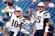 FOXBORO, MA - AUGUST 15: Jimmy Garoppolo #10 and Ryan Mallett #15 of the New England Patriots warm up prior to the preseason game against the Philadelphia Eagles at Gillette Stadium on August 15, 2014 in Foxboro, Massachusetts. (Photo by Jared Wickerham/
