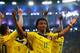 RIO DE JANEIRO, BRAZIL - JUNE 28: Juan Guillermo Cuadrado of Colombia celebrates his team's second goal scored by James Rodriguez (L) during the 2014 FIFA World Cup Brazil round of 16 match between Colombia and Uruguay at Maracana on June 28, 2014 in Rio