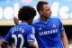 LONDON, ENGLAND - MAY 04: John Terry and Willian of Chelsea react during the Barclays Premier League match between Chelsea and Norwich City at Stamford Bridge on May 4, 2014 in London, England. (Photo by Michael Regan/Getty Images)