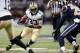 ST. LOUIS, MO - DECEMBER 15: Pierre Thomas #23 of the New Orleans Saints rushes against the St. Louis Rams in the second quarter at the Edward Jones Dome on December 15, 2013 in St. Louis, Missouri. (Photo by Michael Thomas/Getty Images)