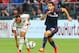 TORONTO, ON - JULY 24: Giampaolo Pazzini #11 of AC Milan chases the ball against Kostas Manolas #24 of Olympiacos FC during International Champions Cup 2014 action at BMO Field July 24, 2014 in Toronto, Ontario, Canada. (Photo by Abelimages/Getty Images)