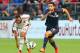 TORONTO, ON - JULY 24: Giampaolo Pazzini #11 of AC Milan chases the ball against Kostas Manolas #24 of Olympiacos FC during International Champions Cup 2014 action at BMO Field July 24, 2014 in Toronto, Ontario, Canada. (Photo by Abelimages/Getty Images)