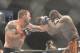 Aug 16, 2014; Bangor, ME, USA; Ryan Bader (red gloves) fights Ovince Saint Preux (blue gloves) during light heavyweight bout at Cross Insurance Center. Mandatory Credit: Gregory J. Fisher-USA TODAY Sports