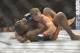 Aug 16, 2014; Bangor, ME, USA; Ryan Bader (red gloves) fights Ovince Saint Preux (blue gloves) during light heavyweight bout at Cross Insurance Center. Mandatory Credit: Gregory J. Fisher-USA TODAY Sports