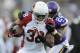 MINNEAPOLIS, MN - AUGUST 16: Captain Munnerlyn #24 of the Minnesota Vikings tackles Andre Ellington #38 of the Arizona Cardinals during the first quarter of the preseason game on August 16, 2014 at TCF Bank Stadium in Minneapolis, Minnesota. (Photo by Han
