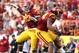 LOS ANGELES, CA - OCTOBER 26: Defensive end Leonard Williams #94 and George Uko #90 of the USC Trojans celebrate a Williams' quarterback sack against the Utah Utes in the fourth quarter at Los Angeles Coliseum on October 26, 2013 in Los Angeles, Californ