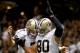 NEW ORLEANS, LA - AUGUST 15: Jimmy Graham #80 of the New Orleans Saints and Luke McCown #7 celebrate after a touchdown during a preseason game between the New Orleans Saints and the Tennessee Titans at Mercedes-Benz Superdome on August 15, 2014 in New Or