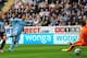 NEWCASTLE UPON TYNE, ENGLAND - AUGUST 17: David Silva of Man City scores the opening goal during the Barclays Premier League match between Newcastle United and Manchester City at St James' Park on August 17, 2014 in Newcastle upon Tyne, England. (Photo