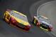 BROOKLYN, MI - AUGUST 17: Joey Logano, driver of the #22 Shell-Pennzoil Ford, leads Jeff Gordon, driver of the #24 Axalta Chevrolet, during the NASCAR Sprint Cup Series Pure Michigan 400 at Michigan International Speedway on August 17, 2014 in Brooklyn, M