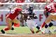 SANTA CLARA, CA - AUGUST 17: Running back C.J. Anderson #22 of the Denver Broncos runs past outside linebacker Ahmad Brooks #55 of the San Francisco 49ers during a preseason game at Levi's Stadium on August 17, 2014 in Santa Clara, California. (Photo by