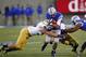 Oct 26, 2013; Colorado Springs, CO, USA; Air Force Falcons wide receiver Colton Huntsman (14) is tackled by Notre Dame Fighting Irish linebacker Joe Schmidt (38) in the fourth quarter at Falcon Stadium. The Fighting Irish won 45-10. Mandatory Credit: Isai