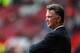 MANCHESTER, ENGLAND - AUGUST 16: Manchester United Manager Louis van Gaal looks on prior to the Barclays Premier League match between Manchester United and Swansea City at Old Trafford on August 16, 2014 in Manchester, England. (Photo by Alex Livesey/Ge