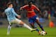 MANCHESTER, ENGLAND - NOVEMBER 05: Seydou Doumbia of CSKA is challenged by Matija Nastasic of Manchester City during the UEFA Champions League Group D match between Manchester City and CSKA Moscow at the Etihad Stadium on November 5, 2013 in Manchester,