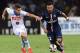 NAPLES, ITALY - AUGUST 11: Jorginho of Napoli and Ezequiel Lavezzi of Paris Saint Germain in action during the pre-season friendly match between SSC Napoli and Paris Saint-Germain FC at Stadio San Paolo on August 11, 2014 in Naples, Italy. (Photo by Giu