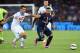 NAPLES, ITALY - AUGUST 11: Christian Maggio of Napoli and Ezequiel Lavezzi of Paris Saint Germain in action during the pre-season friendly match between SSC Napoli and Paris Saint-Germain FC at Stadio San Paolo on August 11, 2014 in Naples, Italy. (Pho