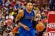 Feb 21, 2014; Philadelphia, PA, USA; Dallas Mavericks forward Shawn Marion (0) brings the ball up court during the second quarter against the Philadelphia 76ers at the Wells Fargo Center. The Mavericks defeated the Sixers 124-112. Mandatory Credit: Howard