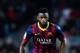 BARCELONA, SPAIN - DECEMBER 17: Alex Song of FC Barcelona runs with the ball during the Copa del Rey round of 32 second leg match between FC Barcelona and Cartagena at Camp Nou on December 17, 2013 in Barcelona, Spain. (Photo by David Ramos/Getty Images