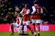 BIRMINGHAM, ENGLAND - JANUARY 01: Robin Van Persie (L) of Arsenal is congratulated by teammates Alex Song (C) and Bacary Sagna (R) after scoring the opening goal of the match during the Barclays Premier Leaue match between Birmingham City and Arsenal at