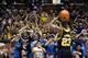 DURHAM, NC - DECEMBER 03: Fans attempt to distract Caris LeVert #23 of the Michigan Wolverines as he shoots a free throw against the Duke Blue Devils during play at Cameron Indoor Stadium on December 3, 2013 in Durham, North Carolina. Duke won 79-69. (P