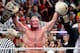 Brock Lesnar celebrates his title win.