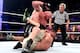 Brock Lesnar pummels John Cena.