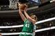 Apr 14, 2014; Philadelphia, PA, USA; Boston Celtics center Kelly Olynyk (41) takes a shot as Philadelphia 76ers forward Thaddeus Young (21) defends during the second quarter of the game at Wells Fargo Center. Mandatory Credit: John Geliebter-USA TODAY Spo
