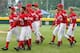 SOUTH WILLIAMSPORT, PA - AUGUST 22: Members of the Canadian team from White Rock, British Columbia walk on the field after losing to the Caribbean team from Willemstad, Curacao during their tournament game in the Little League World Series on August 22, 2