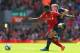 LIVERPOOL, ENGLAND - AUGUST 17: Raheem Sterling of Liverpool is challenged by James Ward-Prowse of Southampton during the Barclays Premier League match between Liverpool and Southampton at Anfield on August 17, 2014 in Liverpool, England. (Photo by Alex