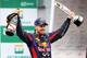 SAO PAULO, BRAZIL - NOVEMBER 24: Sebastian Vettel of Germany and Infiniti Red Bull Racing celebrates on the podium after winning the Brazilian Formula One Grand Prix at Autodromo Jose Carlos Pace on November 24, 2013 in Sao Paulo, Brazil. (Photo by Cliv