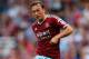 LONDON, ENGLAND - AUGUST 16: Mark Noble of West Ham in action during the Premier League match between West Ham United and Tottenham Hotspur at Boleyn Ground on August 16, 2014 in London, England. (Photo by Julian Finney/Getty Images)