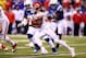INDIANAPOLIS, IN - JANUARY 04: Running back Jamaal Charles #25 of the Kansas City Chiefs carries the ball against the Indianapolis Colts carries during a Wild Card Playoff game at Lucas Oil Stadium on January 4, 2014 in Indianapolis, Indiana. (Photo by A