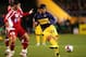 TOKYO - DECEMBER 12: Ever Banega of Boca Juniors passes the ball during the FIFA Club World Cup semi final match between Boca Juniors and Etoile Sportive du Sahel at the National Stadium on December 12, 2007 in Tokyo, Japan. (Photo by Koji Watanabe/Gett