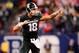 Dec 7, 2013; Indianapolis, IN, USA; Michigan State Spartans quarterback Connor Cook (18) reacts after throwing a pass for a touchdown during the second quarter of the 2013 Big 10 Championship game against the Ohio State Buckeyes at Lucas Oil Stadium. Mand