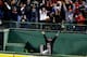 BOSTON, MA - OCTOBER 13: Boston police officer Steve Horgan reacts as Torii Hunter #48 of the Detroit Tigers tries to catch a grand slam hit by David Ortiz #34 of the Boston Red Sox in the eighth inning of Game Two of the American League Championship Seri