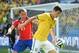 June 28, 2014; Belo Horizonte, BRAZIL; Brazil player Oscar (right) battles for the ball with Chile player Marcelo Diaz during the round of sixteen match in the 2014 World Cup at Estadio Mineirao. Mandatory Credit: Tim Groothuis/Witters Sport via USA TODA