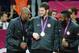 LONDON, ENGLAND - AUGUST 12: Kobe Bryant #10, Kevin Love #11 and James Harden #12 of the US Men's Senior National Team celebrates on the podium with the Gold Medal after their Men's Gold Medal Basketball Game against Spain on Day 16 of the London 2012 Oly