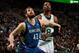 BOSTON, MA - DECEMBER 16: Kevin Love #42 of the Minnesota Timberwolves boxes out Jeff Green #8 of the Boston Celtics on December 16, 2013 at the TD Garden in Boston, Massachusetts. NOTE TO USER: User expressly acknowledges and agrees that, by downloading