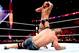 Cesaro stretches his neck mid-battle with John Cena.