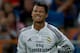 MADRID, SPAIN - AUGUST 19: Cristiano Ronaldo of Real Madrid CF grimaces in pain during the Supercopa first leg match between Real Madrid and Club Atletico de Madrid at Estadio Santiago Bernabeu on August 19, 2014 in Madrid, Spain. (Photo by Gonzalo Arro