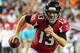 ATLANTA, GA - AUGUST 08: T.J. Yates #13 of the Atlanta Falcons runs the ball in the third quarter of a preseason game against the Miami Dolphins at the Georgia Dome on August 8, 2014 in Atlanta, Georgia. (Photo by Scott Cunningham/Getty Images)