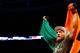 BOSTON, MA - AUGUST 17: Conor McGregor celebrates following his win against Max Holloway in their featherweight bout at TD Garden on August 17, 2013 in Boston, Massachusetts. (Photo by Jared Wickerham/Getty Images)