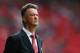 MANCHESTER, ENGLAND - AUGUST 16: Manchester United Manager Louis van Gaal looks on prior to the Barclays Premier League match between Manchester United and Swansea City at Old Trafford on August 16, 2014 in Manchester, England. (Photo by Alex Livesey/Ge