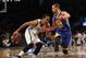Jan 8, 2014; Brooklyn, NY, USA; Brooklyn Nets point guard Shaun Livingston (14) controls the ball in front of Golden State Warriors point guard Stephen Curry (30) during the fourth quarter of a game at Barclays Center. The Nets defeated the Warriors 102-9
