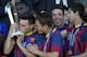 NYON, SWITZERLAND - APRIL 14: Munir El Haddadi of FC Barcelona (L) kisses the Lennart Johansson trophy after winning the UEFA Youth League Final match between Benfica Lisbon and FC Barcelona at Colovray Stadion on April 14, 2014 in Nyon, Switzerland. (Pho